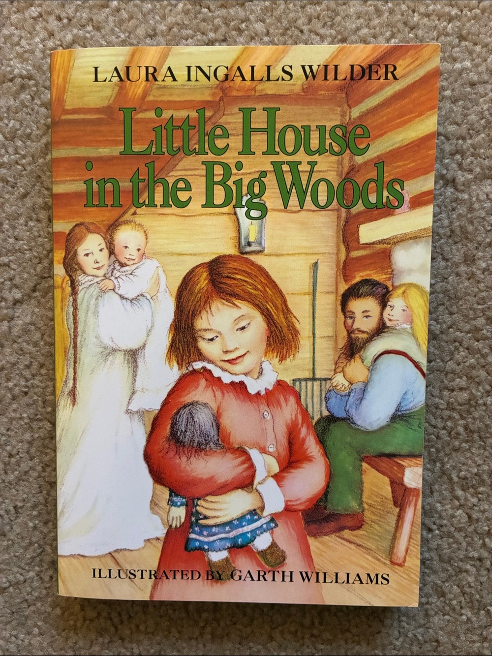 Book “Little House In The Big Woods” by Laura Ingalls Wilder